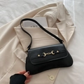 Retro black leather baguette bag with signature gold horsebit buckle on blazer - Black