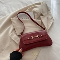 Retro deep red leather baguette bag with gold horsebit buckle and shoulder strap - Red