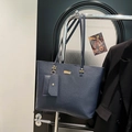 Minimalist navy blue tote bag set with pebble leather texture and gold metal logo - Blue