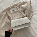 Minimalist white shoulder bag with woven texture flap and sleek faux leather finish - White