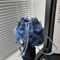 Blue denim bucket bag with frayed edges and white star patterns in vintage street style - Star - Blue