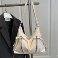 Cremefarbene Schultertasche mit Schleife und Reißverschlüssen aus glattem Leder-Design - Weiß