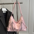 Rosa Hobo-Tasche aus weichem Leder mit silbernen Reißverschlüssen und Schleifendetail - Rosa