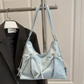 Light blue faux leather shoulder bag with sweet bow tie and silver zipper accents - Blue