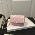 Mini pink crossbody bag with white polka dots and matching slim shoulder strap - Pink