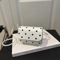 Mini white polka dot crossbody bag with black dots and a slim PU leather strap - White