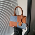 Bolso de mano chic en contraste de cuero marrón y tela gris de diseño único - Marrón