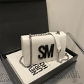 Chic white rectangular chain bag with black SM letter logo for elegant daily commuting style - White