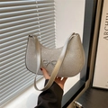Silver sequin hobo bag for women with a metallic bow detail and a chic shoulder strap - Silver