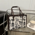 Borsa tote in stile francese con stampa bianca e nera e manici in pelle marrone - Marrone