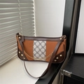 Vintage caramel patchwork shoulder bag with floral monogram and gold chain detail - Brown