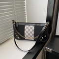 Retro black leather underarm bag with clover pattern and gold chain detail - Black