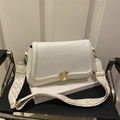 Minimalist white leather crossbody bag with golden metal buckle and woven strap - White