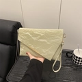 Light green pleated envelope clutch bag with gold metal trim and detachable wrist strap - Green
