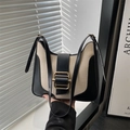 Minimalist beige canvas and black leather shoulder bag with golden buckle detail - Black