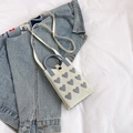 Mini cream knitted crossbody bag with gray heart pattern and top handle design - Off White