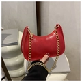 Red patent leather crescent bag with bold gold chain strap and sleek minimalist design - Red