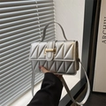 Silver quilted geometric handbag with metallic satin finish and top handle strap - Silver