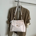 Elegant cream white chain shoulder bag with a delicate lace bow and gold twist lock clasp - White