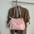 Chic pink PU leather shoulder bag with gold rotating lock and lace bow decoration - Pink
