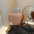 Brown woven saddle bag with unique silver metallic handle and leather shoulder strap - Brown