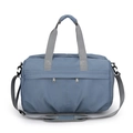 Close-up of durable blue-grey nylon travel bag with reinforced grey handles and metal zippers - Blue