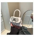 Detail of white leather mini bag with sparkling rhinestone bow and gold chain strap - White Type 1