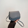 Minimalist canvas saddle bag in grayish blue with adjustable strap and logo print - Black