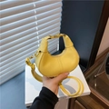 Mini crescent bright yellow leather handbag with gold clasp and adjustable strap - Yellow