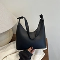 Minimalist black matte leather underarm bag with adjustable strap and silver buckle - Black