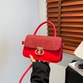 Elegant red leather handbag with sparkling diamond patchwork and gold clasp - Red
