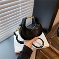 Minimalist black crescent hobo bag with gold hardware and adjustable leather strap - Black