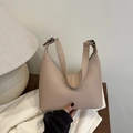 Minimalist beige crescent underarm bag with adjustable strap and silver metal hardware - Khaki