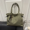 Large olive green nylon tote bag with drawstring detail and tennis racket charm accessory - No Pendant / Green
