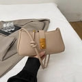 Elegant beige baguette shoulder bag with vintage gold square buckle and knot strap detail - Khaki