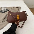 Minimalist dark brown baguette bag with gold buckle and thin knotted shoulder strap - Brown