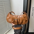 Chic tan pleated faux leather underarm bag with decorative silver double-buckle strap - Brown