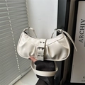 White pleated faux leather underarm bag with metal buckle and adjustable strap - White