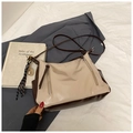 Detail of retro dual-tone hobo bag with adjustable strap and vintage tassel charm - No Pendant / Khaki