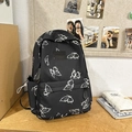 Mochila ligera negra con patrón de mariposas blancas para viajes y escuela - Negro