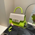 Green and beige two-tone leather crossbody bag with gold rotating lock and canvas flap - Green