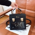 Schicke schwarze transparente Tasche mit goldenen Beschlägen und verstellbaren Trägern - Schwarz