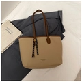 Detail of khaki pebbled leather tote bag with brown handles and fashion text - No Pendant / Khaki