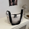 White nylon crossbody tote bag with adjustable black shoulder strap and fashion label - White