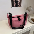 Pink minimalist crossbody tote bag with black adjustable strap and fashion label - Rose Pink