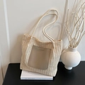 Borsa a spalla in paglia intrecciata beige con tasca in ecopelle marrone e manici a corda - Bianco