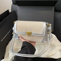 Retro beige canvas shoulder bag with silver leather trim and gold twist lock clasp - Silver
