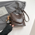 Dark brown retro bucket bag in matte leather with woven handle and rabbit charm - No Pendant / Brown