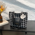 Klassische schwarz-weiße Tweed-Tragetasche mit Ledertasche und goldener Aufschrift - Schwarz