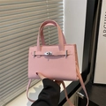 Pink lychee textured leather tote bag with metallic turn-lock and crossbody strap - Pink